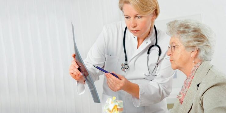 the doctor prescribes treatment for pain in the lower back